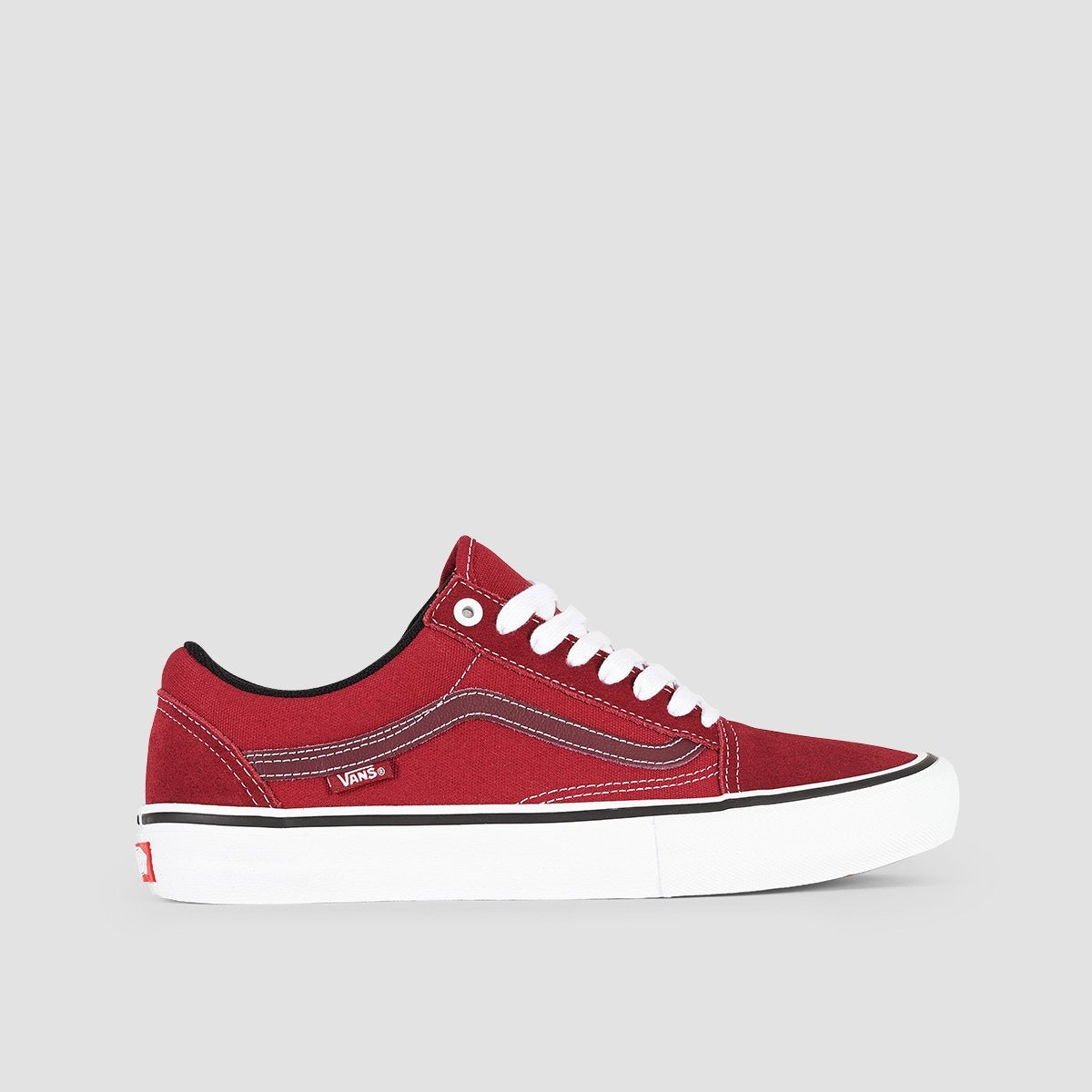 red and white low top vans