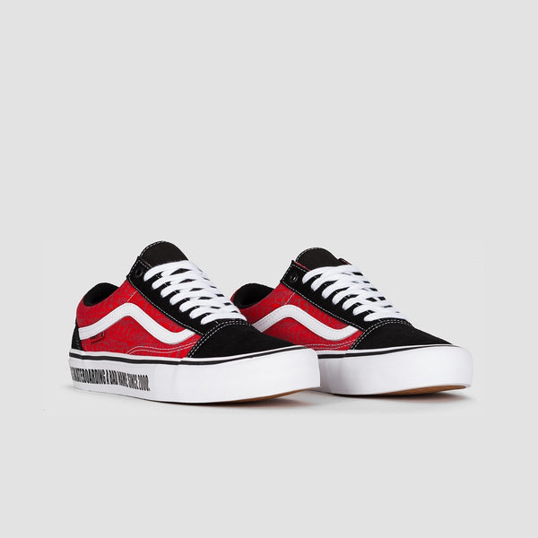 red and black strap vans