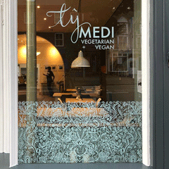 Ty Medi Cafe Machynlleth Blossom and Brush window film