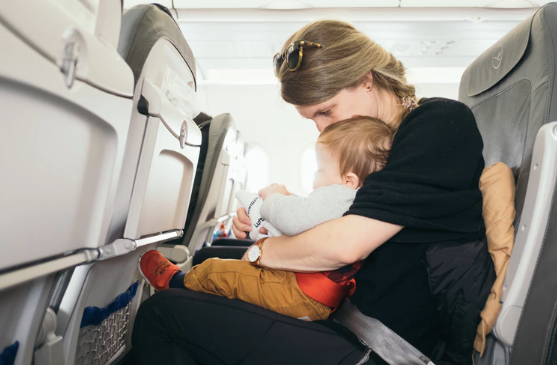 Mother and baby on a flight