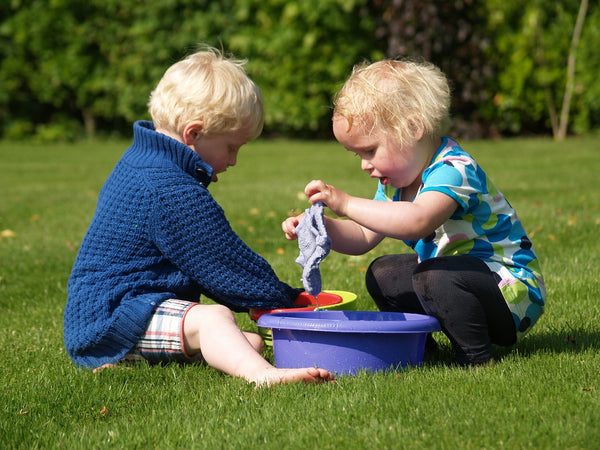 Kids playing with a washcloth