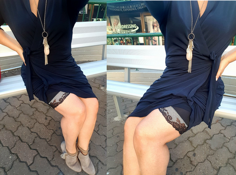 female sitting showing silver trimmed lingerie shorts under dress