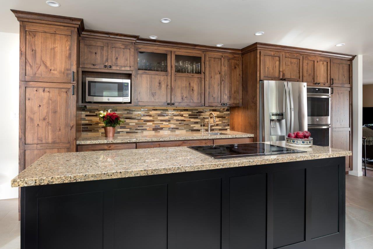 Kitchen Prep Area Island Cooktop, Knotty Alder & Black Painted Cabinets by Jackie Lopey Venue