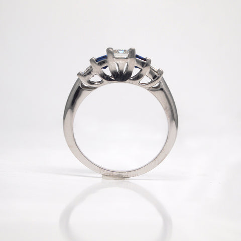 profile view of 3-stone engagement ring