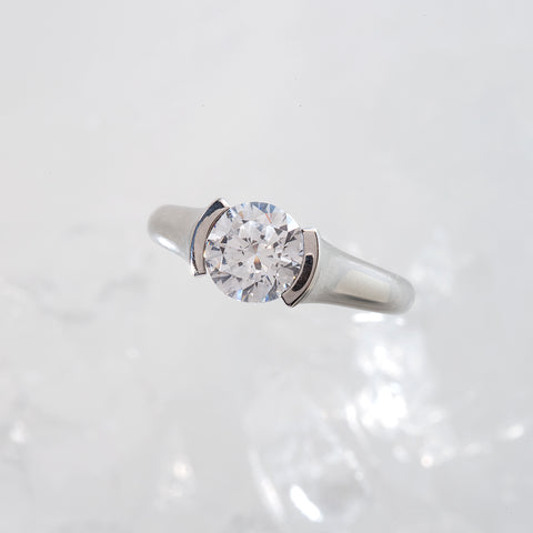 half bezel diamond engagement ring