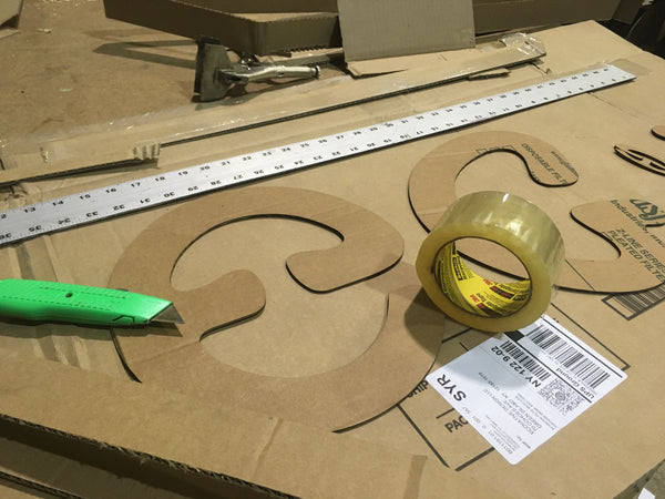 Cutting shapes to make cardboard growth forms