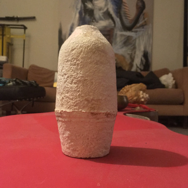 Vase grown from found items