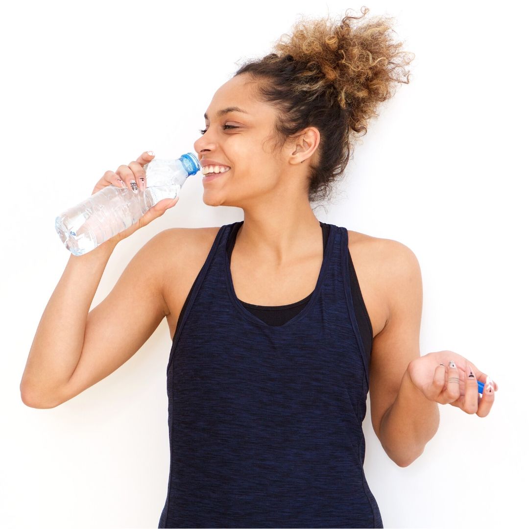 Keep Your Curls Hydrated This Summer By Staying Hydrated