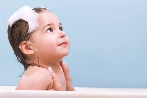 baby during bubble bath