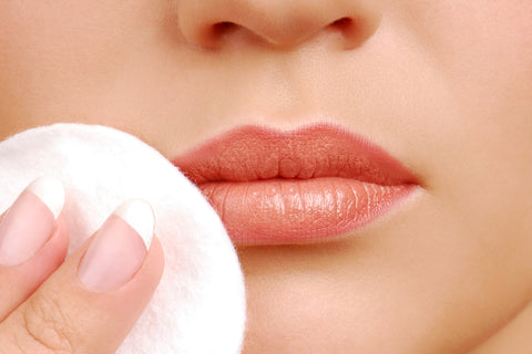 woman removing lipstick