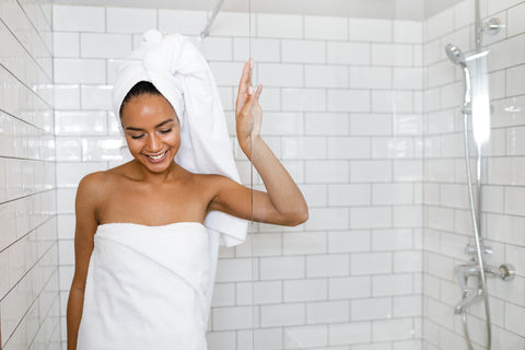 woman in shower learned how to use conditioner