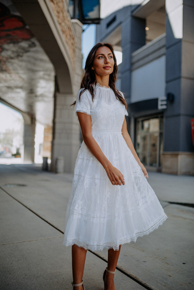 white lace midi dress with sleeves