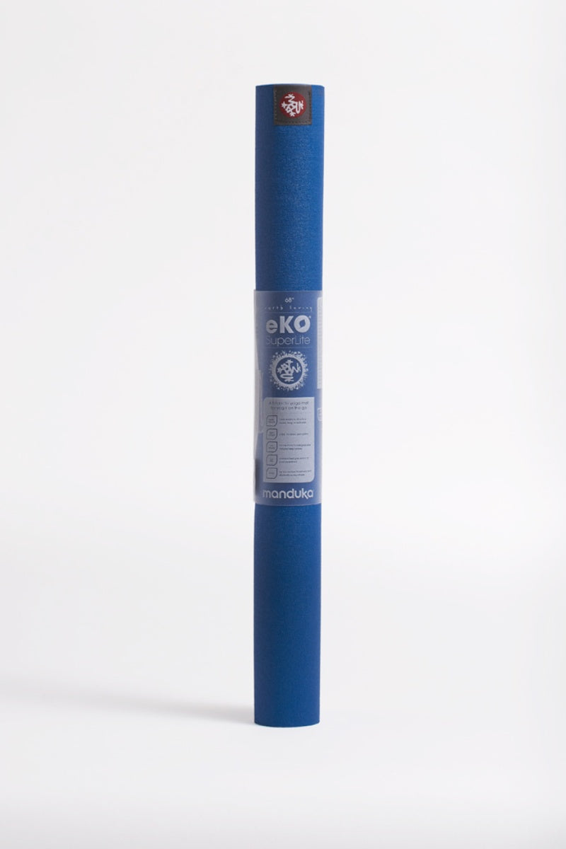 SEA YOGI // eKO SuperLite Yoga mat, only 1kg in Truth Blue style by Manduka, standing image