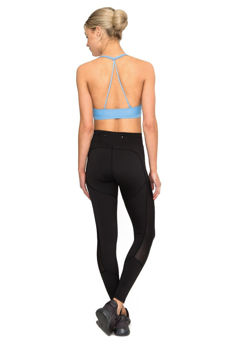 DHARMA BUMS DBX PERFORMANCE COMPRESSION LEGGING IN BLACK AND BACK IMAGE
