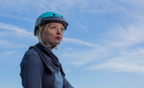 a lady wearing a sawako blue helmet 