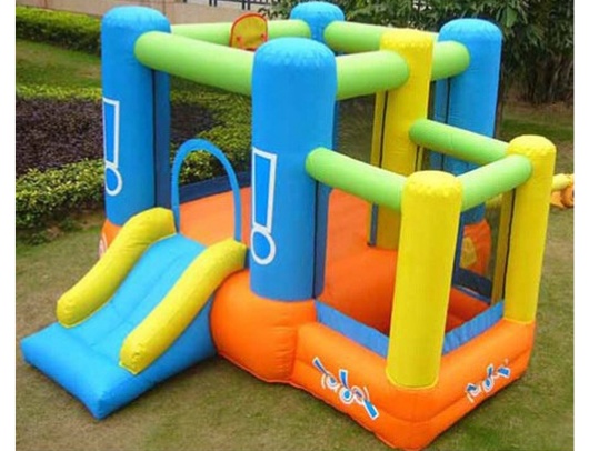 Kidwise Little Star Bounce House with Slide on grass