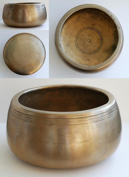 short stout singing bowl with an inward-facing lip and flat bottom