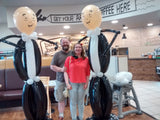 Jim and Lyndsay with Bob and Bert balloon sculptures