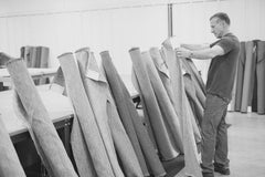Glen Reid Deigns examining Revolution Fabrics by the Yard