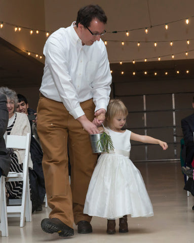 Little flower girl with dad