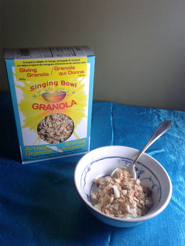 A bowl and box of Giving Granola