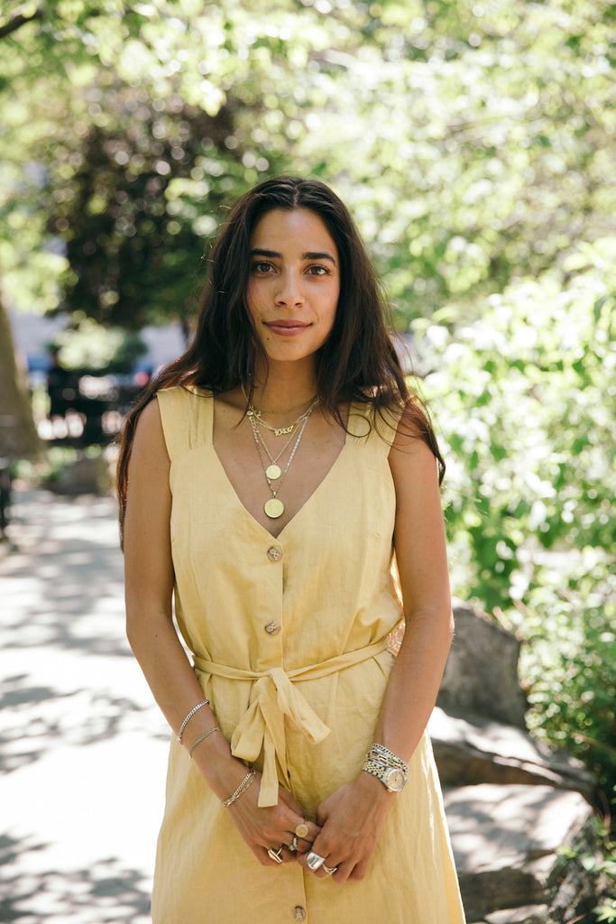 Waist-up sunlit photo of Bianca Valle. 