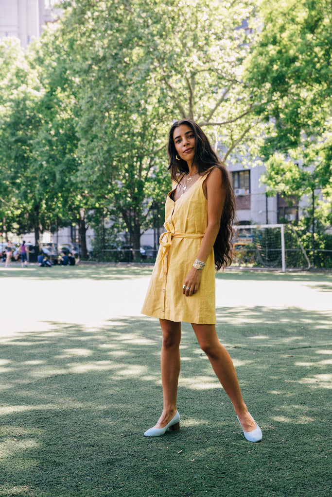 Bianca Valle posing in a NYC park wearing her Coclico heels.