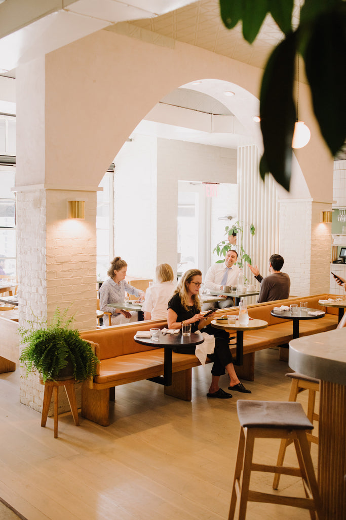 Picture of the restaurant, De Maria with seated customers. 