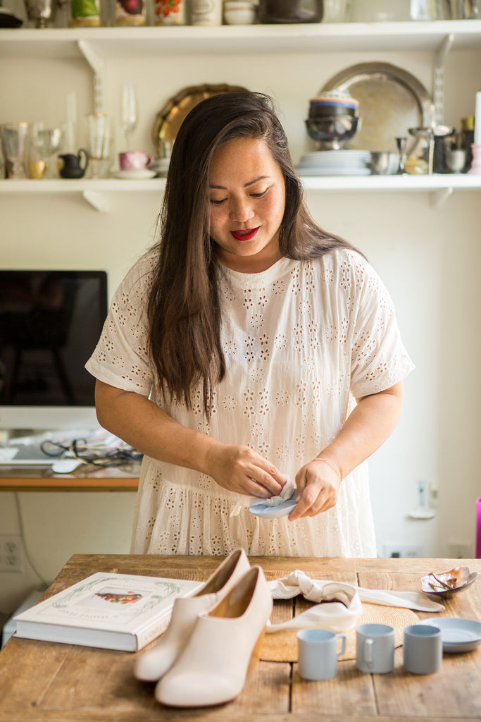 Diana Yen preparing for a design display. 