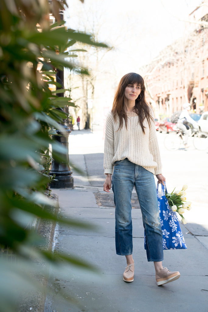 Erin Boyle posing in the streets of Brooklyn wearing the Pekos Wedge in Bone Leather.