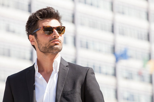 Stylish man wearing sunglasses