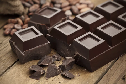 A close up image of chopped chocolate bars