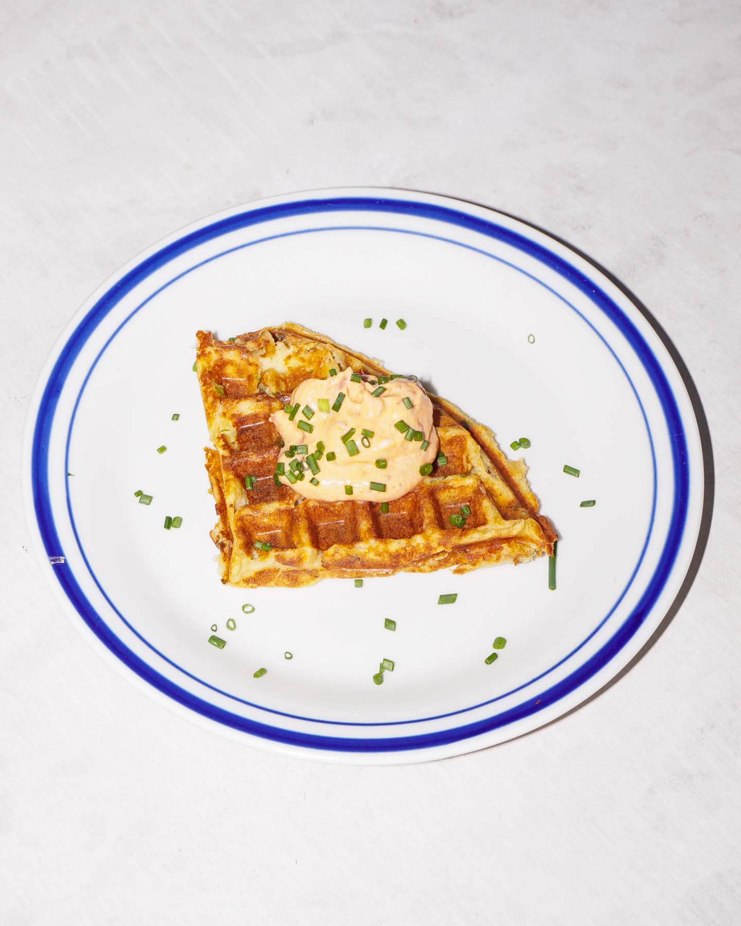 Caldo leftover mashed potato waffle with sriracha yogurt