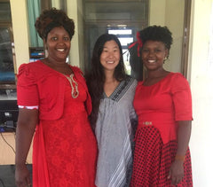 love is project happy artisans in kenya with founder chrissie lam in the middle