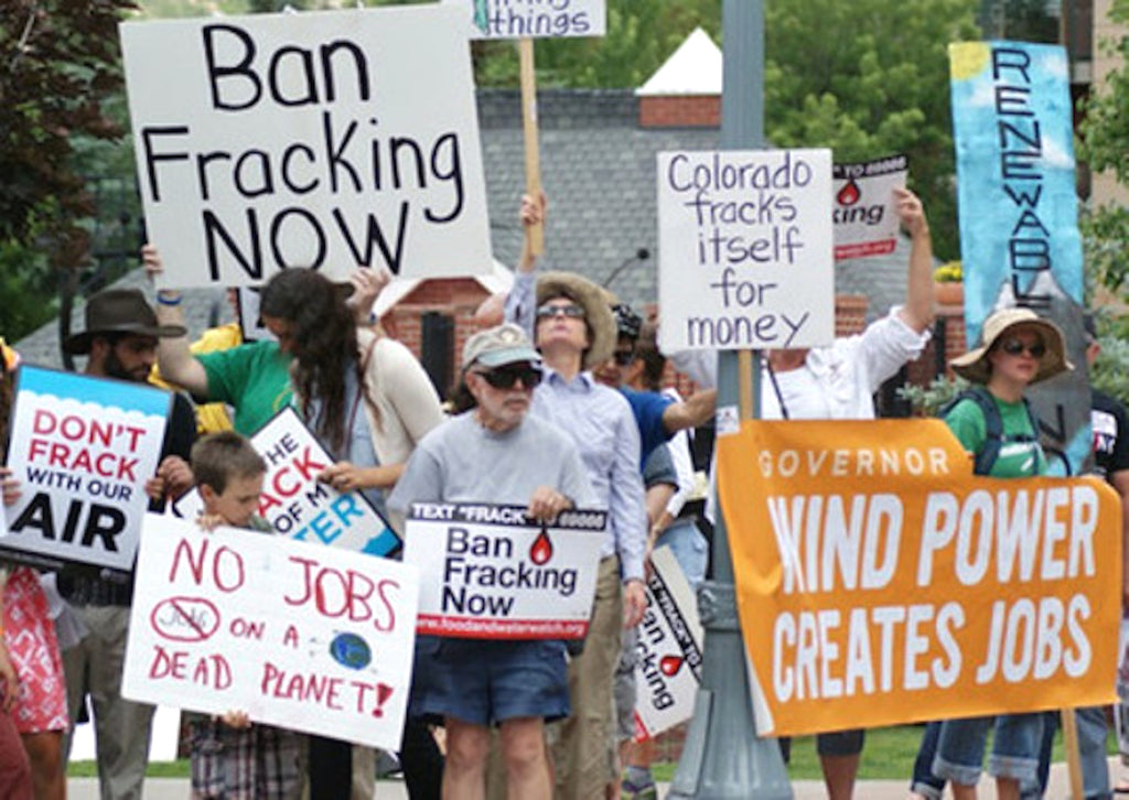 protestors-ban-fracking-signs-climate-change