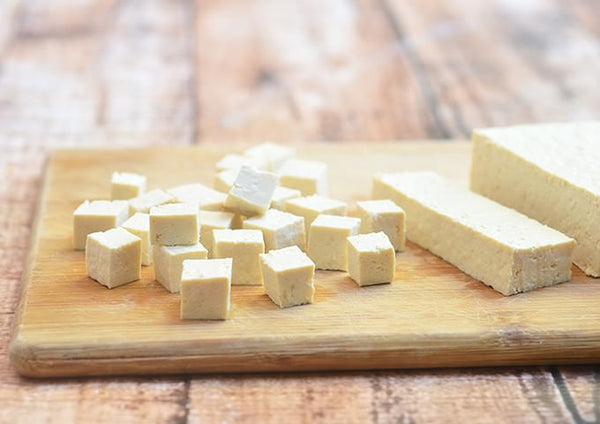 tofu-sliced-on-wood-soy-harmful-for-planet