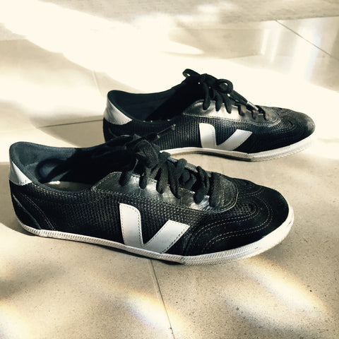 black-and-gray-veja-shoes-in-sunlight