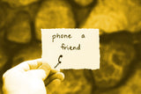 Note card saying Phone a Friend