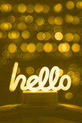 Neon sign saying hello to reflect connection