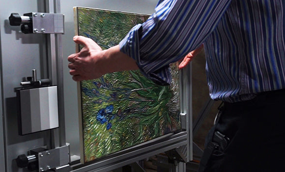 Iris by Van Gogh being loaded into a scanner