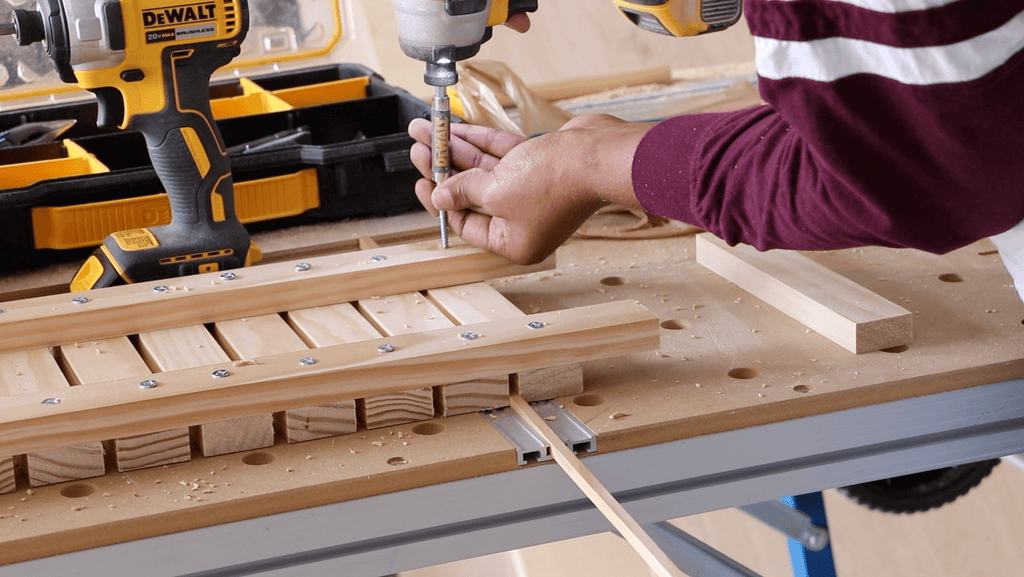 Drilling wood screws into 1x2 lumber using a Dewalt Impact Drill