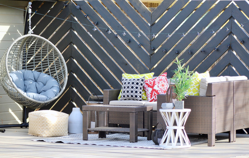 DIY Floating Deck featuring a Chevron Privacy wall and NewTechWood Composite decking for the backyard