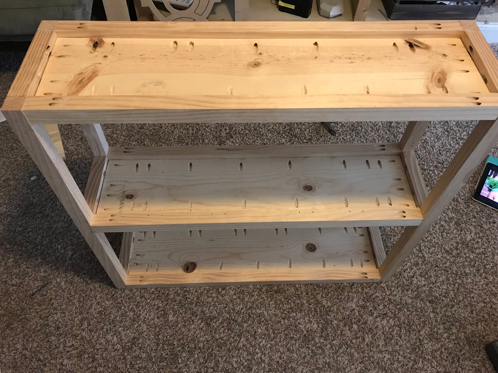 DIY industrial console cart for the home entryway featuring caster wheels