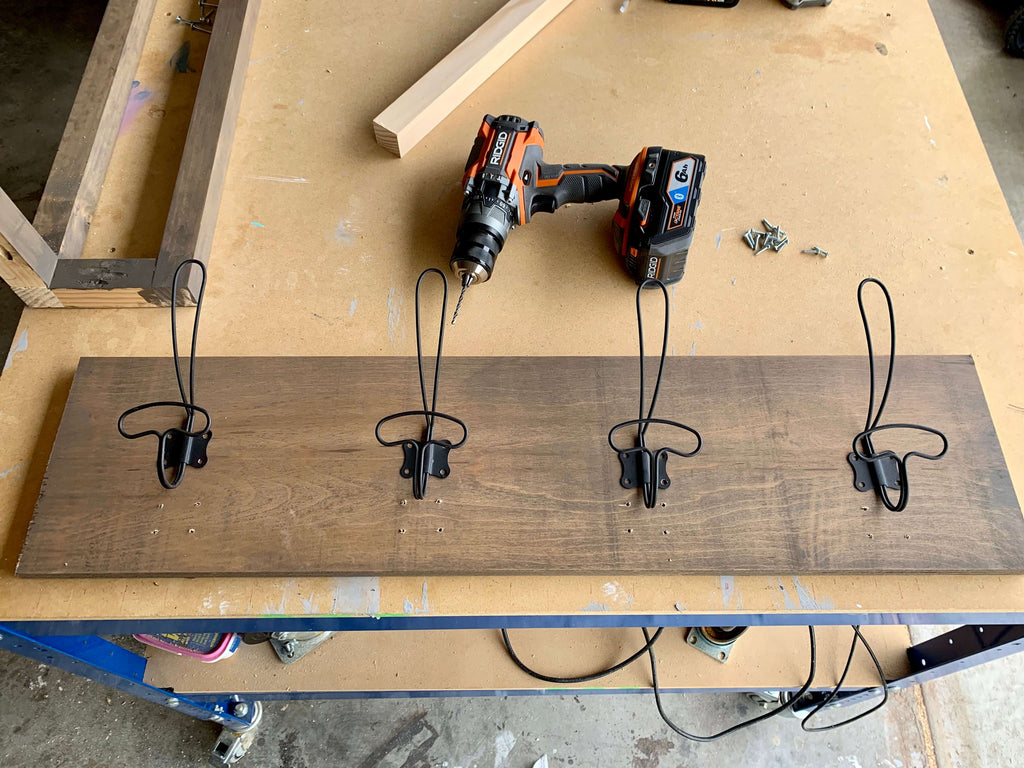 Adding coat hooks to a DIY hall tree bench