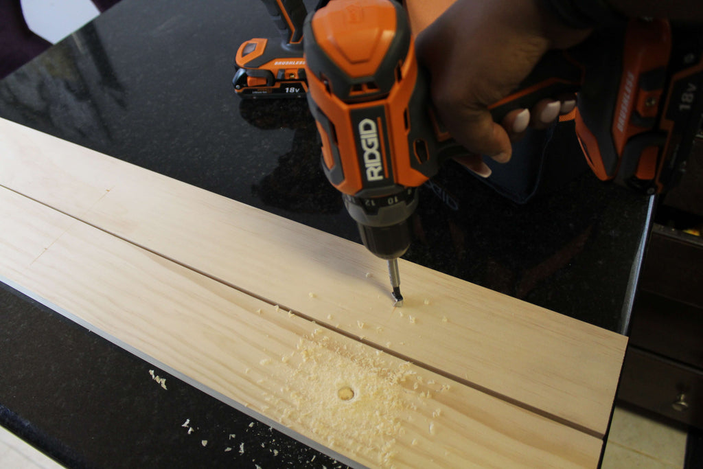 Drilling holes for a magazine rack using the RIDGID Drill/Driver 