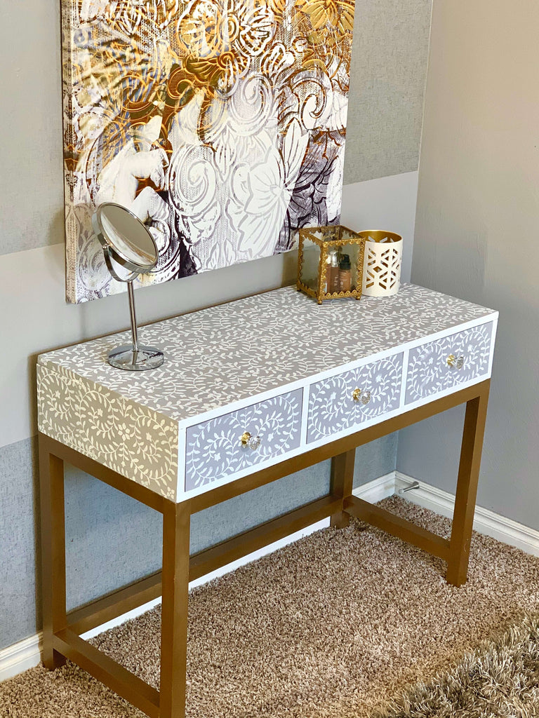 DIY Makeup Vanity desk with a stenciled design and gold legs