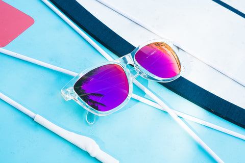 folded polarized sunglasses on table