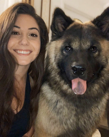 Selfie of Fuse employee Gabrielle with dog Kato inside