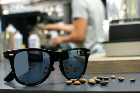 Black sunglasses in a coffee shop