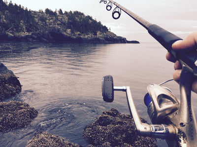 a man inshore fishing Photo by Alan Bishop on Unsplash